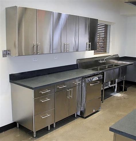 Kitchen with Stainless Steel Cabinets and Quartz Countertops 